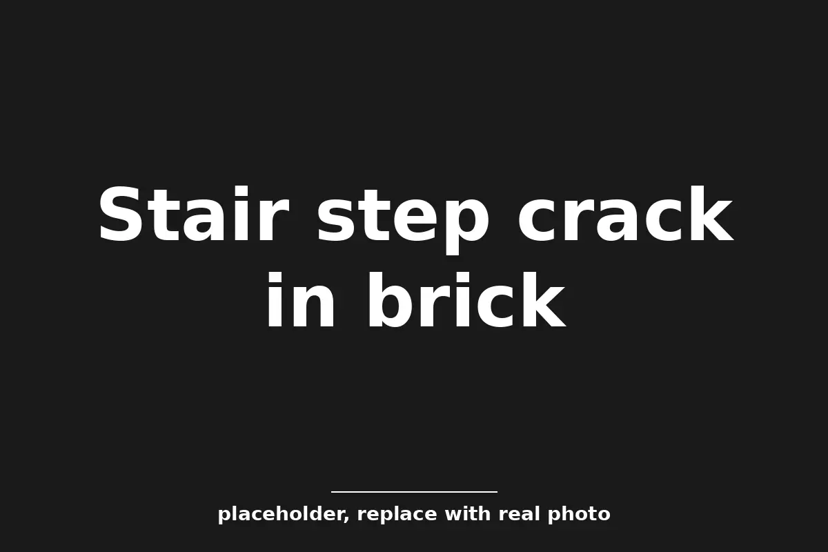 Stair step crack in brick on a Tulsa house, the kind foundation crack repair starts with
